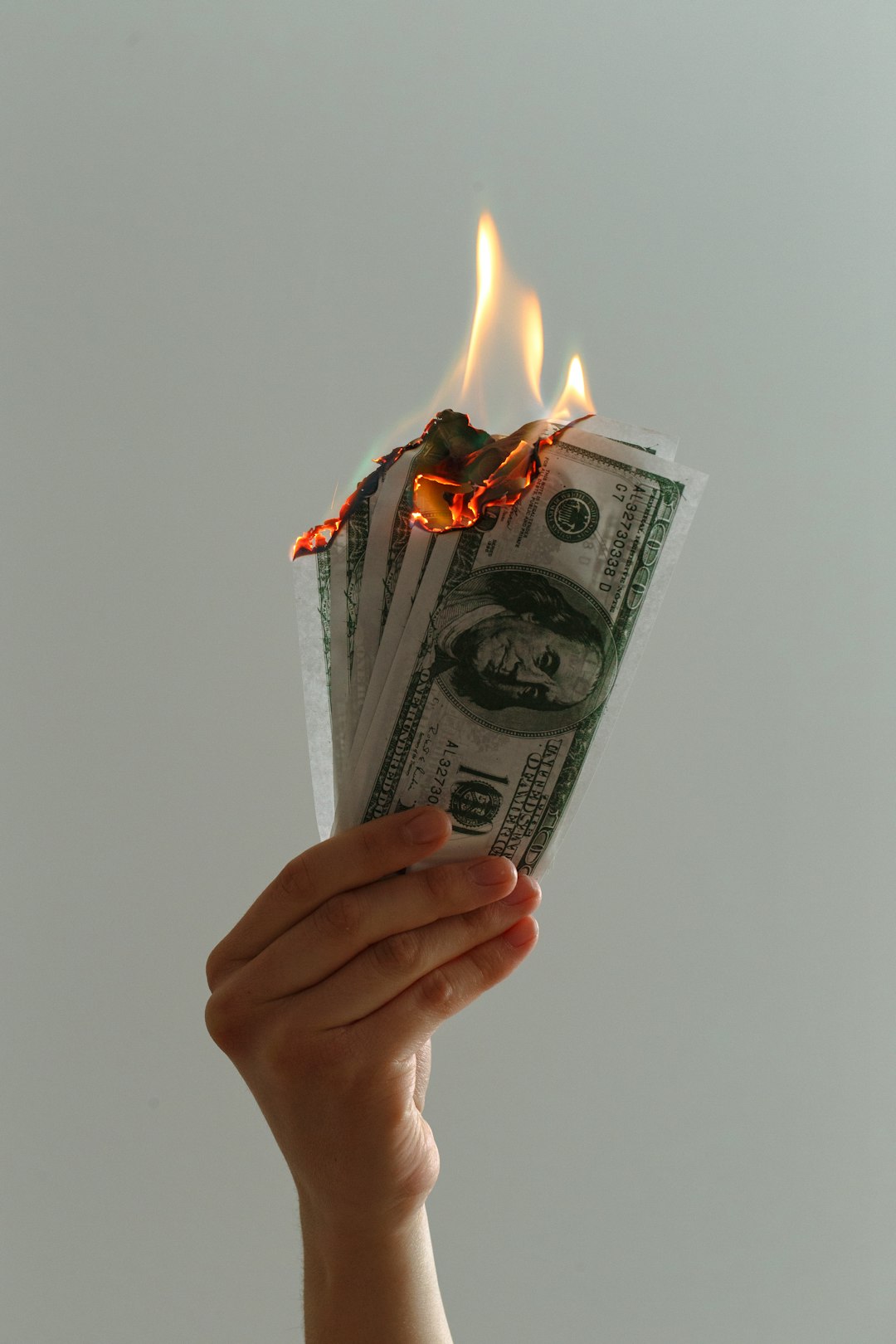 time-lapse-photography-of-several-burning-us-dollar-banknotes-blolco2k4m0
